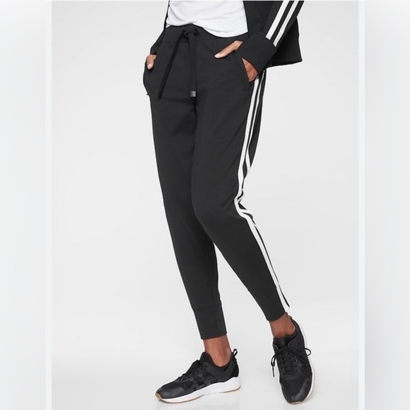 Athleta Pants - Athleta Woman’s Black Joggers with White Stripe Accents, Size Large Petite.
